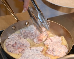 Placing chicken skillet
